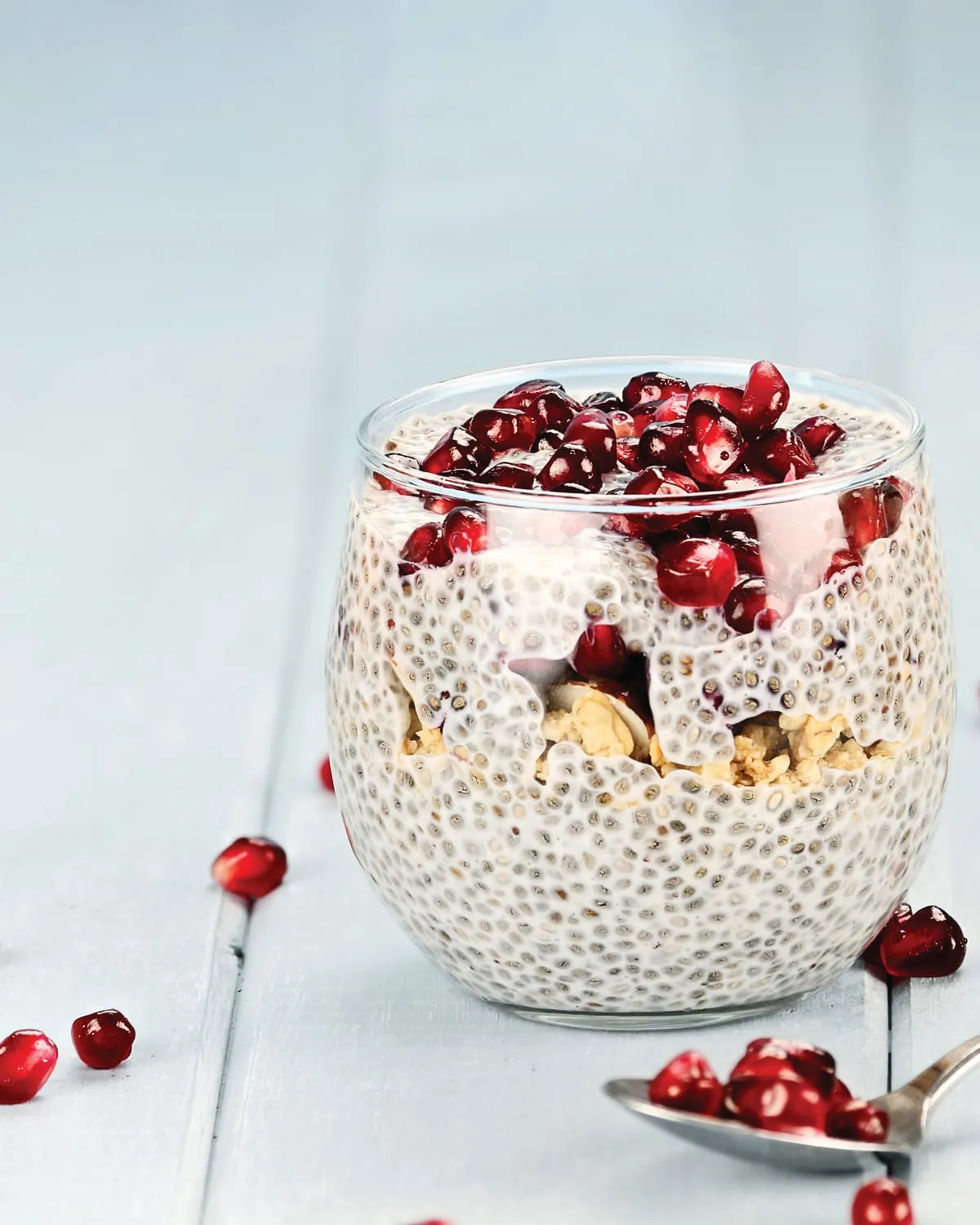Chia pudding topped with pomegranate seeds