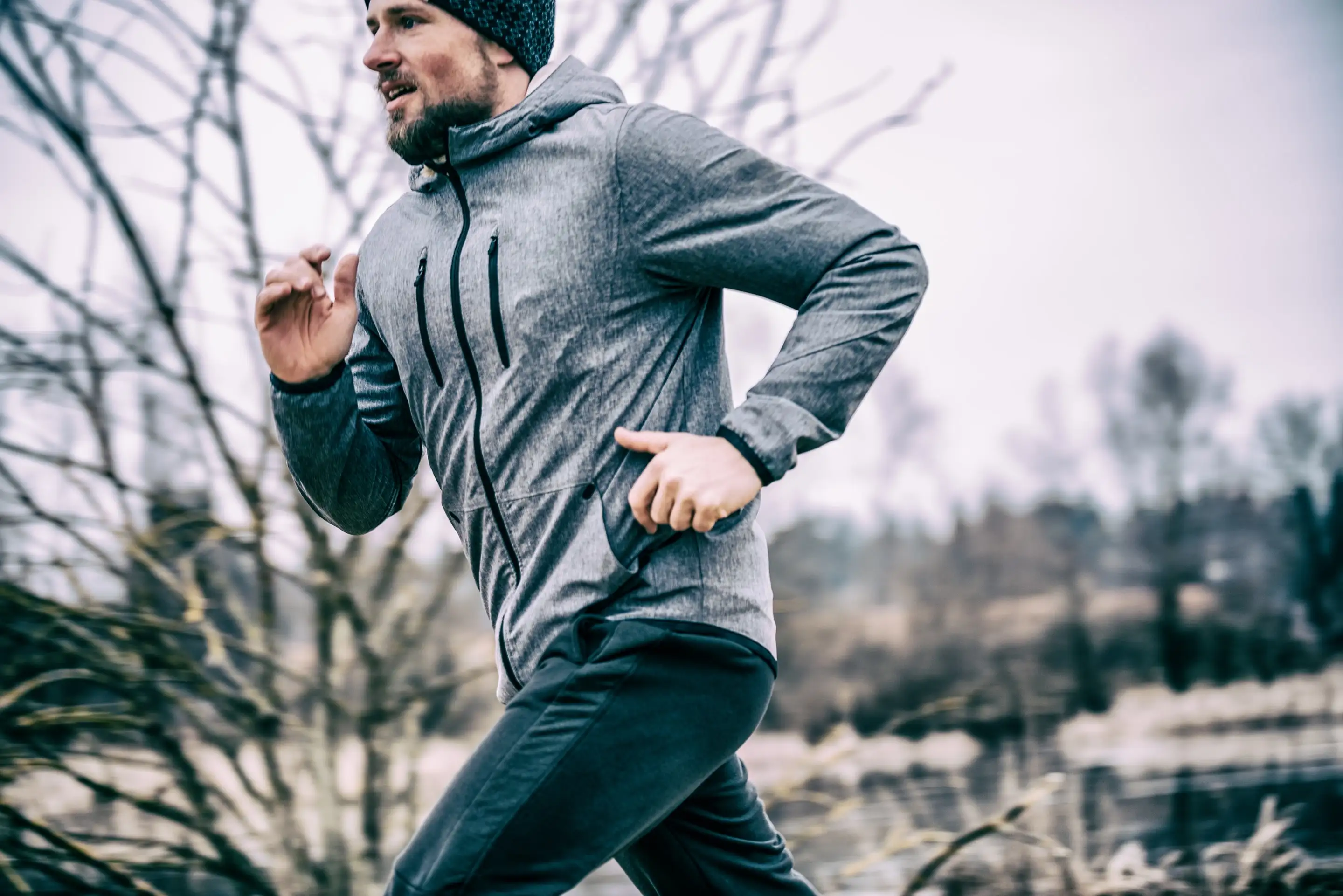 A runner training outdoors on a winter morning