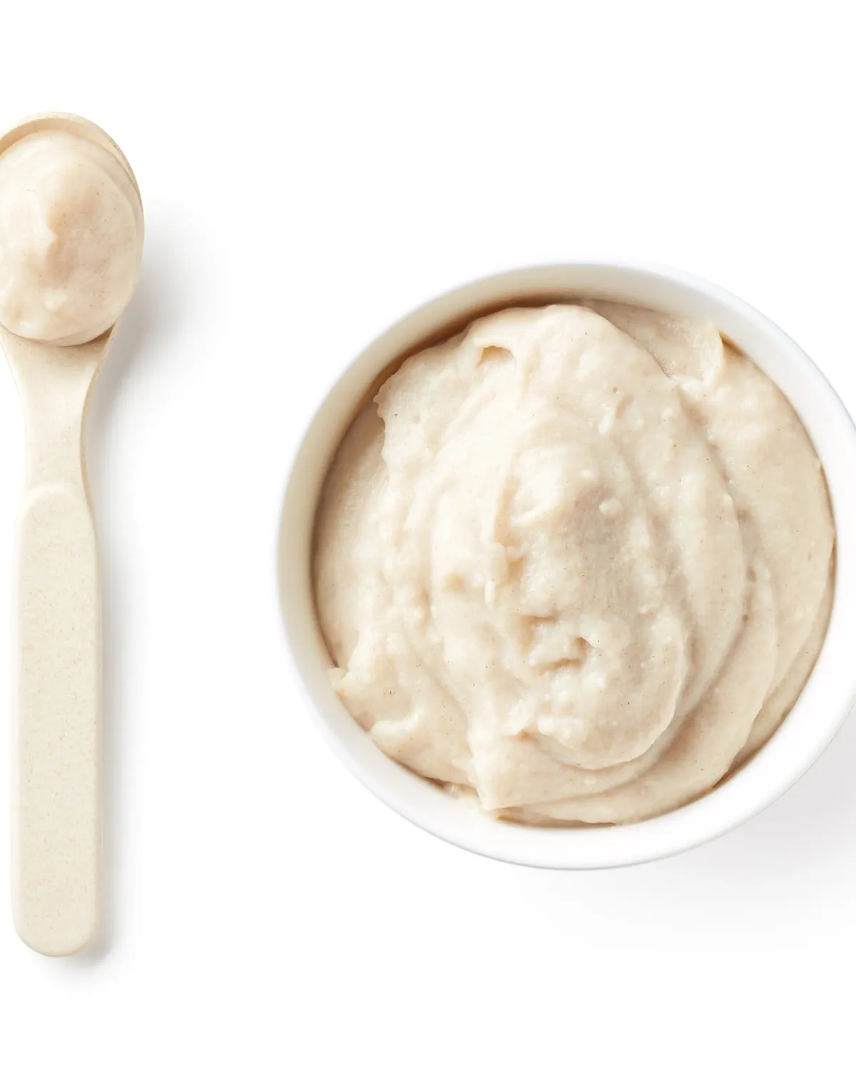 Bowl of creamy porridge with a spoon